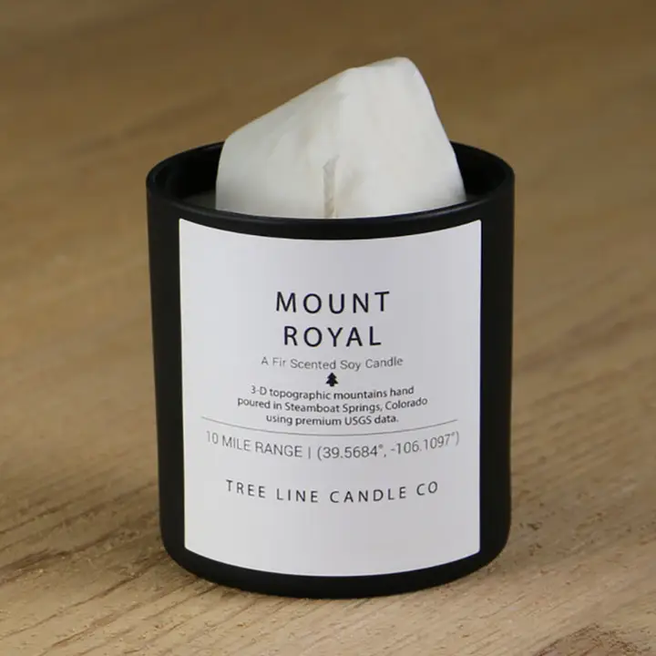 Tree Line Mount Royal candle in a black vessel.